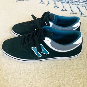 New Balance tennis shoes, skate shoes. Numeric